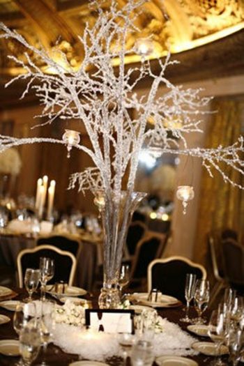 glittered branches as a winter wedding centerpiece