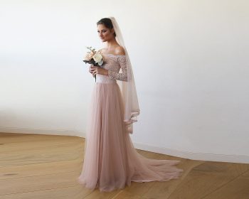 The Trend To Think Pink: These days, brides have so much freedom when it comes to the color of their wedding gown. Blush pink wedding dresses are the hottest trend so be open to other colors when trying on your wedding gowns!