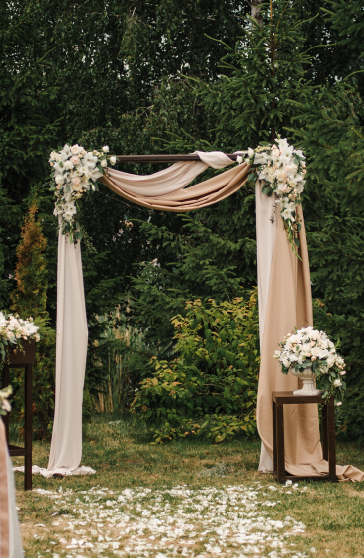 Whether you choose to do your ceremony under one, or if you just want one to take photos under, a DIY wedding arch is a must-have for any bride this year. You will love these beautiful outdoor arch ideas! 